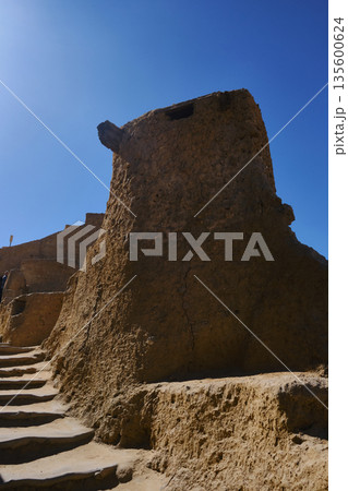 Ancient Mudbrick Fortification under Clear Sky 135600624