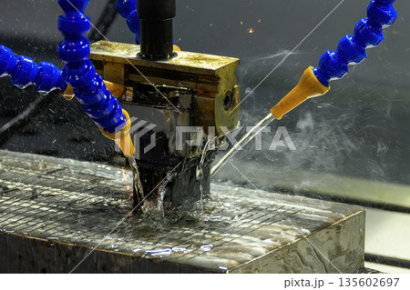 EDM Machine Operation with Graphite Electrode in Precision Machining Process 135602697