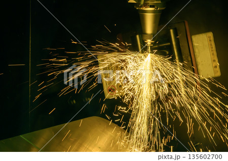 Close Up of Fiber Laser Cutting Machine Cutting Stainless Steel Square Tube Close Up of Fiber Laser Cutting Machine Cutting Stainless Steel Square Tube 135602700