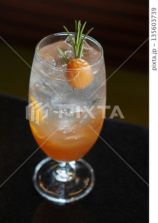 top view ice plum soda in a glass on a marble toth, decorated with plums and branches, nature background, food, drink, object, decor, copy space 135603739