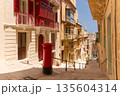 Colorful balconies on a narrow street in Valletta, Malta 135604314