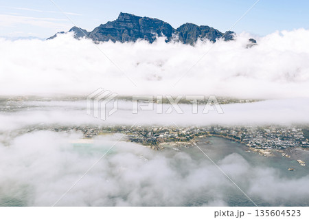 Ariel view of Cape Town city from a helicopter above the clouds. South Africa 135604523