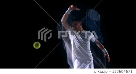 Tennis player overhead swing with motion effect on dark background. Tennis player overhead swing with motion effect on dark background. 135604671