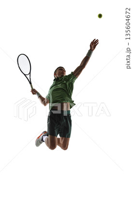 Tennis player mid air serve strike isolated on white background. Tennis player mid air serve strike isolated on white background. 135604672