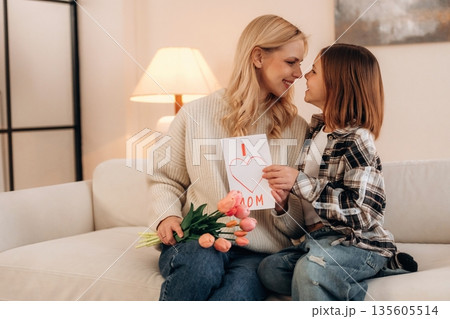 The mother's day gifts, celebration. Woman and her daughter are together 135605514