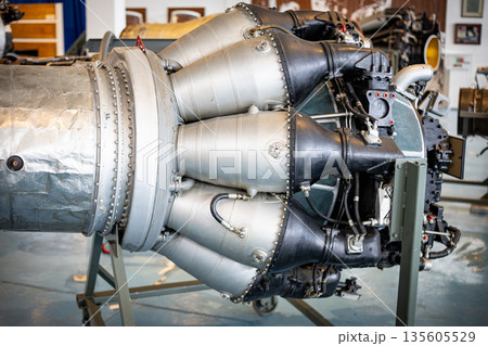 Vintage jet engine displaying complex mechanical design 135605529
