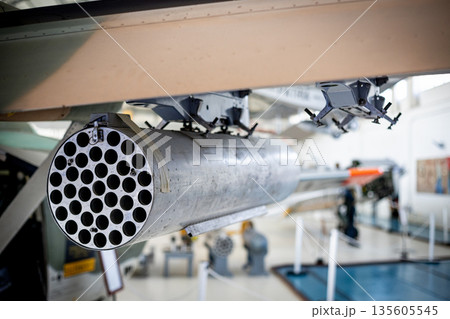Military aircraft displaying multiple rocket launcher pod Military aircraft displaying multiple rocket launcher pod 135605545