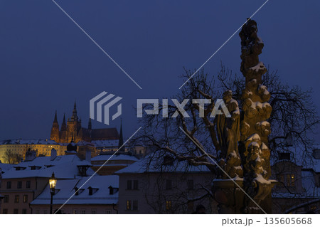 Karluv most statue viewing Prague Castle at winter night Karluv most statue viewing Prague Castle at winter night 135605668