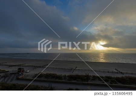 Sunrise over sandy beach in Groemitz at the Baltic Sea 135606495