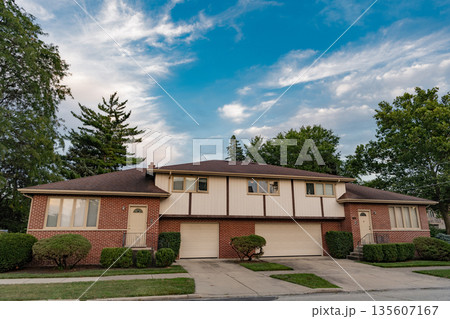 Suburban neighborhood. Suburban house architecture. Private house. Neighborhood architecture. Property in neighborhood. Residential property house. Residence architecture. Housing supply 135607167