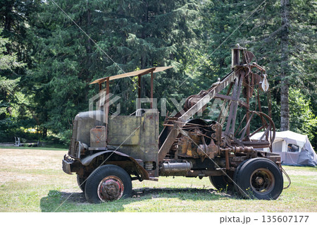 Logging truck equipment. Rusty old school truck. Rusty truck for logging. Machinery equipment. Old rusty logging truck Logging truck equipment. Rusty old school truck. Rusty truck for logging. Machinery equipment. Old rusty logging truck 135607177