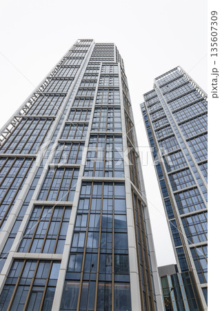 Modern Glass Skyscraper Exterior Low Angle View Modern Glass Skyscraper Exterior Low Angle View 135607309