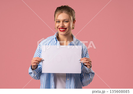 Woman Holding Horizontal White A4 Paper Poster. Copy Space. Mock-Up Banner, 135608085