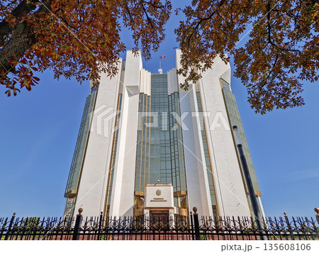 Chisinau, Moldova - September 24, 2025 Presidential Palace of Moldova low angle view with the Presidency building framed by tall chestnut trees with rusted autumn leaves 135608106