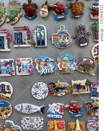 Colorful Turkish fridge magnets arranged on a gray background Colorful Turkish fridge magnets arranged on a gray background 135608352