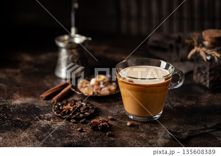 Coffee in a glass with cream 135608389