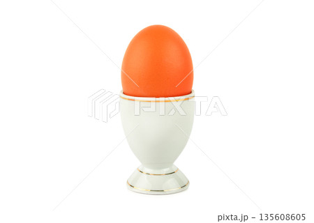 Brown Boiled Egg in White Porcelain Stand Isolated on White Brown Boiled Egg in White Porcelain Stand Isolated on White 135608605