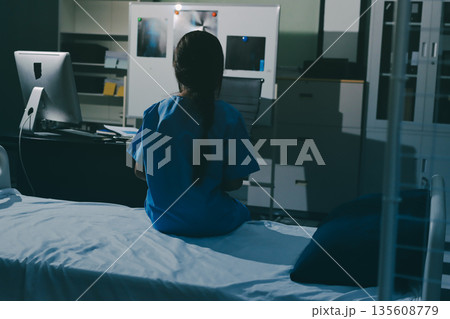 A patient with depression looks outside. A patient with depression looks outside. 135608779