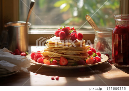 Delicious pancakes with berries and syrup 135609336