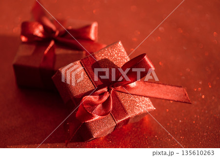Glittery Red Gift Boxes with Satin Bows and Glittery Heart. Romantic Valentines Day Flatlay 135610263
