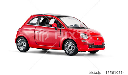 Red retro toy car isolated on white Red retro toy car isolated on white 135610314