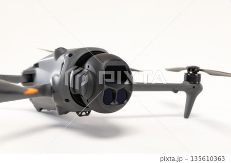 Modern drone with triple cameras isolated on white background 135610363