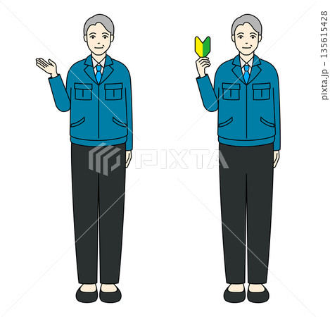 初心者マークを持ち案内する作業着姿のシニア男性 135615428