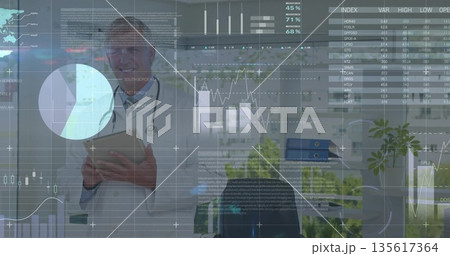 Doctor in white coat reviewing digital overlays in medical office, with clipboard and stethoscope Doctor in white coat reviewing digital overlays in medical office, with clipboard and stethoscope 135617364
