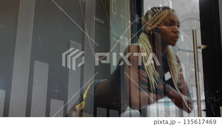 Performing woman holding plank on bench in gym studio, with smartwatch and data charts, copy space Performing woman holding plank on bench in gym studio, with smartwatch and data charts, copy space 135617469