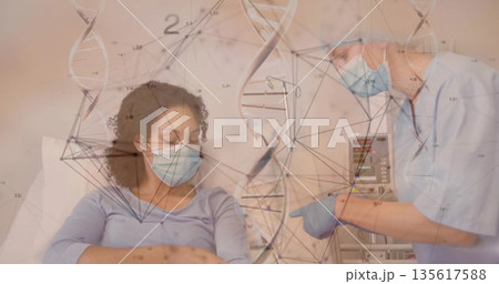 Pointing nurse showing infusion pump beside patient receiving IV line in hospital with DNA graphics 135617588