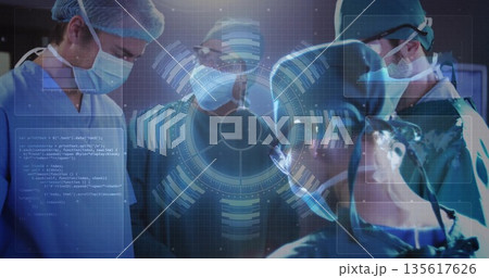 Operating surgical team in scrubs performing surgery in operating room, with holographic overlays 135617626
