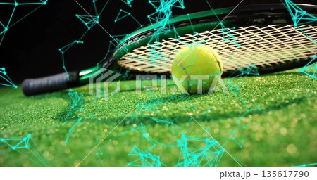 Tennis racket and tennis ball lying on synthetic grass court, with turquoise network overlay Tennis racket and tennis ball lying on synthetic grass court, with turquoise network overlay 135617790