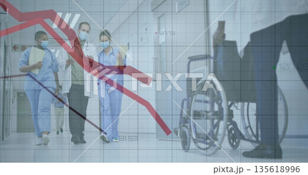 Walking staff in uniforms holding folders near wheelchair in ward corridor, displaying grid overlay 135618996