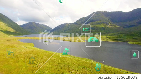 Reflecting freshwater lake mirroring diffused clouds in remote valley, with floating data icons 135619038