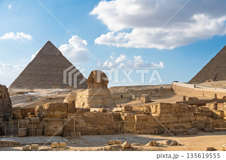 Majestic Giza Necropolis Pyramids and Sphinx Under a Sky of Clouds, Enduring Historical Landmark 135619555