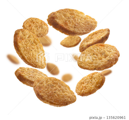 Bread croutons levitate on a white background 135620961
