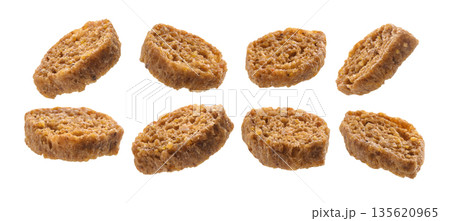 A set of bread croutons. Isolated on a white background A set of bread croutons. Isolated on a white background 135620965