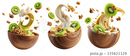 Fresh banana, kiwi, crunchy walnuts and granola with creamy yogurt smoothie splash in wooden bowl isolated on white background 135621129