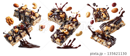 Chocolate coated nut protein energy fitness bar topped with almonds, cashews, walnuts, and chocolate drizzle on white 135621130