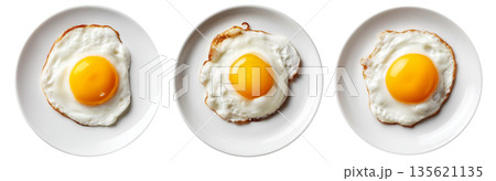 Sunny-side up fried egg with crisp edges on white plate from above on white transparent background, breakfast simplicity Sunny-side up fried egg with crisp edges on white plate from above on white transparent background, breakfast simplicity 135621135