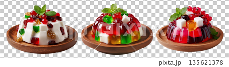 Bright red jelly salad dessert topped with fresh berries, mint leaves, marshmallows and candy isolated on white background Bright red jelly salad dessert topped with fresh berries, mint leaves, marshmallows and candy isolated on white background 135621378
