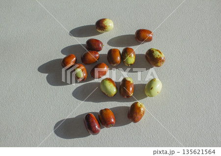 These are dates that are ripening red. These are dates that are ripening red. 135621564