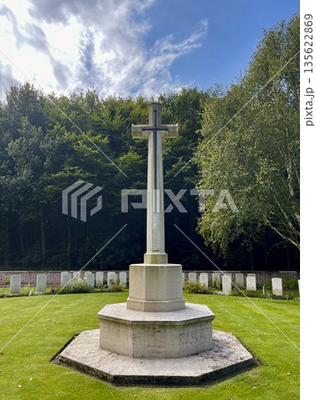 Stone cross commemorating fallen soldiers at war cemetery Stone cross commemorating fallen soldiers at war cemetery 135622869