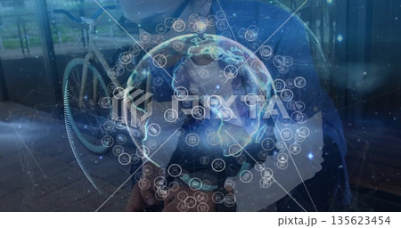 Sitting man wearing glasses blazer holding smartphone on bench outside, bicycle and network globe Sitting man wearing glasses blazer holding smartphone on bench outside, bicycle and network globe 135623454
