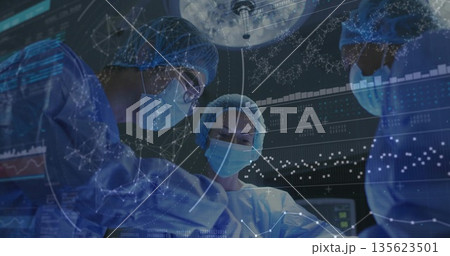 Performing surgery three surgeons in blue scrubs using scalpels in operating room, digital overlays 135623501