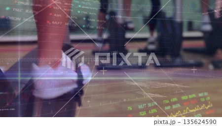 Pumping exerciser's legs in leggings on treadmill at gym, with stock data overlay, copy space Pumping exerciser's legs in leggings on treadmill at gym, with stock data overlay, copy space 135624590