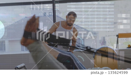 Guiding woman in leggings pushing leg press machine in studio by windows, with metric overlays 135624599
