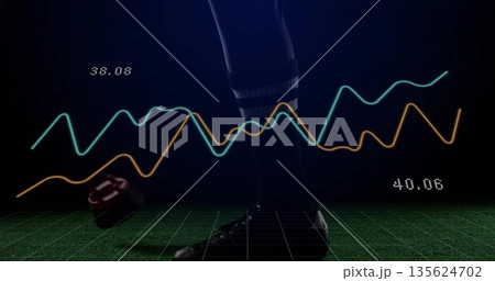 Showing athlete leg in striped sock, cleat on green grid floor, with sensor, graphs and metrics 135624702