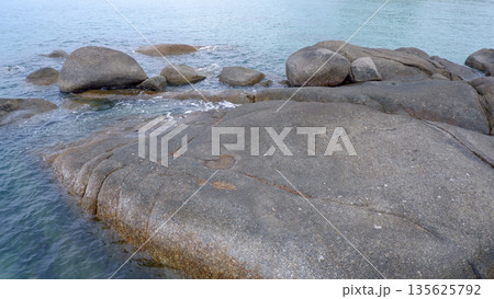 Natural Granite Stone Formation in the Ocean at Siangau Beach Indonesia 135625792