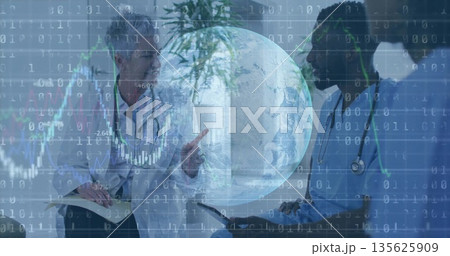 Consulting doctors in lab coat and scrubs examining data with digital overlays on tablet in clinic Consulting doctors in lab coat and scrubs examining data with digital overlays on tablet in clinic 135625909